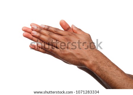 African-american male hands with palms rubbing together against white isolated studio background. Success or money anticipation Royalty-Free Stock Photo #1071283334