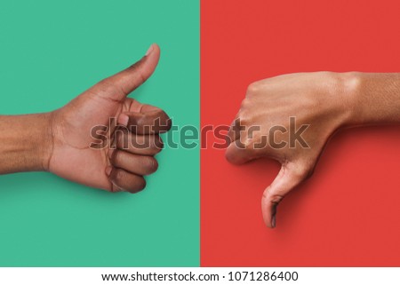 Collage of black hands showing thumb up and down at green and red background, copy space. Approval and disagreement gestures. Mockup for survey or poll Royalty-Free Stock Photo #1071286400