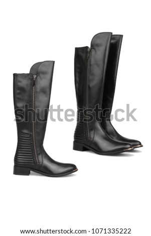 Black female knee high boots with natural leather isolated on white backround