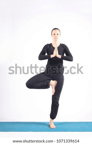 young caucasian woman in yoga position