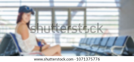 Blurred photo of girl in waiting room