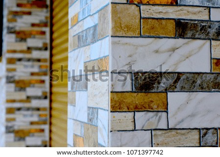 building post mosaic and metal rolling door as background