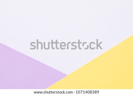 pastel violet and yellow paper background.