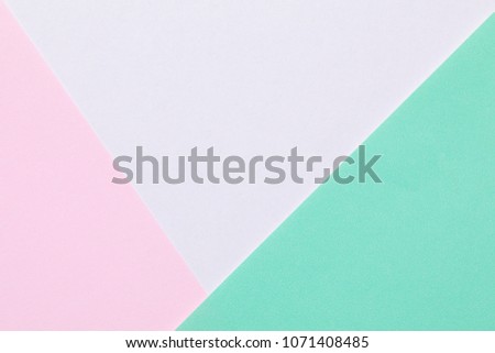 beautiful background with pastel colored papers .