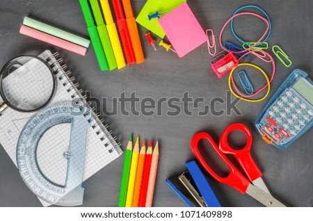 School Supplies on a Blackboard with Space for Text. Back to School.