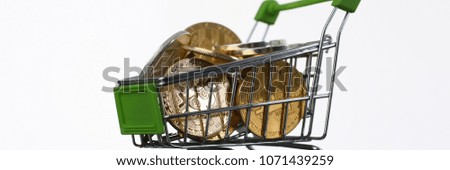 Basket from supermarket with coins crypto currency e bitcoin ethereum litetcoin on a black gray background with reflection exchange purchase sale exchanger closeup.