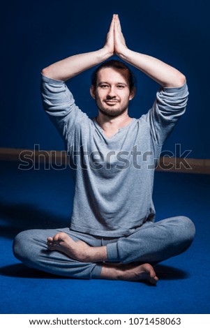 
yogi on a blue background in different poses