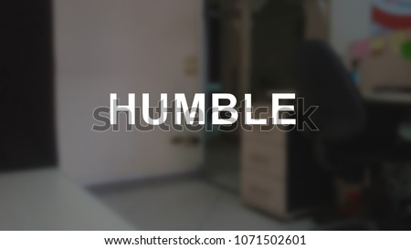 Humble word with blurring business background