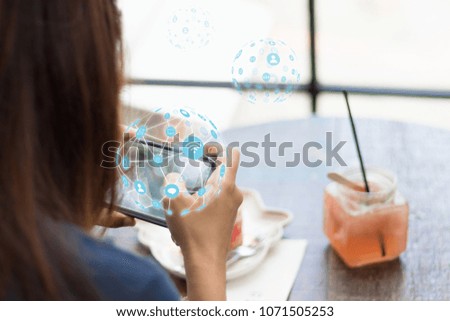 Woman hand using mobile smartphone with network icon