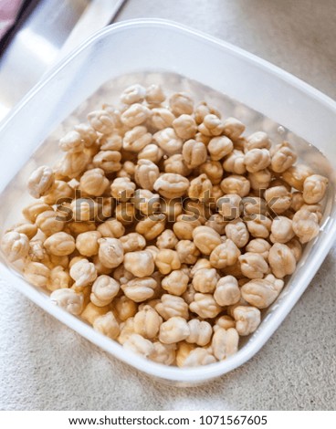 Chickpeas left in water to soak before cooking.