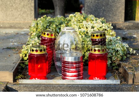 Flowers with lanterns at the cemetery, the day of all the saints