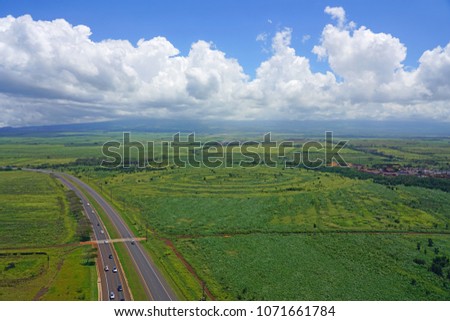 Aerial view of green fields in Maui, the Valley Isle, in Hawaii