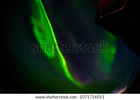 Aurora Borealis (Northern Lights, sometimes referred to as Polar Lights), a natural light display in the Earth's sky at Arctic Circle, Iceland
