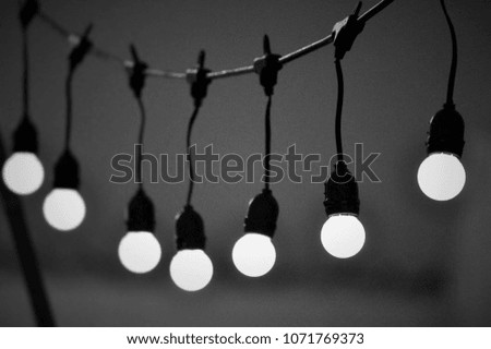 Black and White picture on night light bulb.