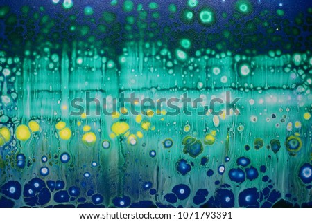 Background abstraction in the form of rainbow cells and bubbles 