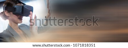 Business woman in virtual reality headset with hands up and blurry sunset transition