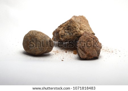 stones and sand on white background, isolated objects