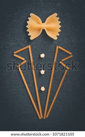 stylized waiter made from pasta