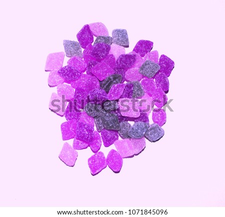 Multicolored lollipops on a neutral background. Photo of sweets.