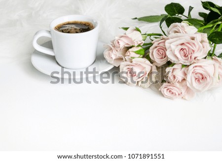 Wedding composition. A gentle picture for a story or a blog. Pink roses, coffee and fluffy rug. Beautiful morning. Flat lay. Copy space.