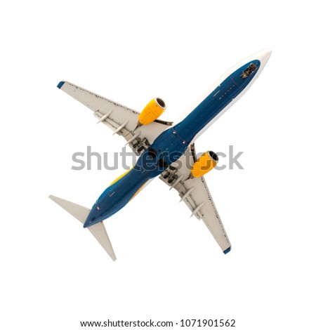 Big commercial passenger airlplane. Landing or take off. Isolated on white. Bottom view