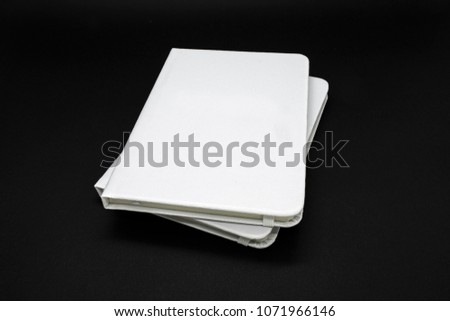 Two white notebooks isolated
