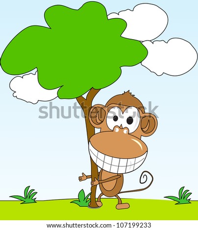 funny monkey hugging a tree in the background of the park