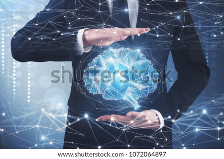 Businessman holding digital polygonal brain on blurry background. Artificial intelligence and future concept. 3D Rendering 