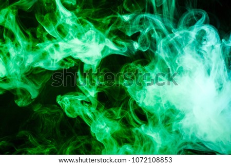 Green  smoke on black background