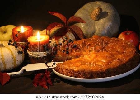 Halloween pumpkins, candles, witch's time. Thanksgiving day pie