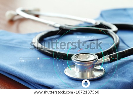 Data Security system Shield Protection Verification concept.Doctor hand working with stethoscope and laptop computer digital tablet with virtual dashboard interface.world by NASA
