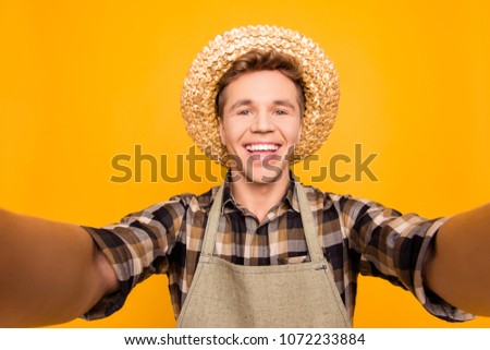 Close up portrait of cheerful funky funny friendly glad handsome student looking at camera isolated on background