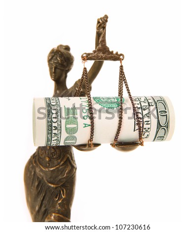 A picture of a Themis statue with dollar notes on the scale as a symbol of corruption over white background