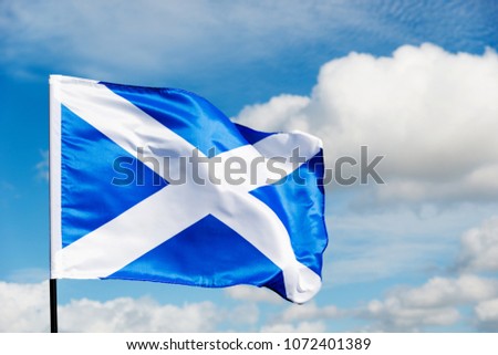 Scottish flag flying on windy.