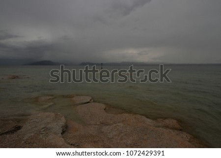 Cliffs on the lakeside (Sirmione, Lake Garda, Italy)