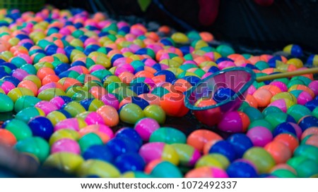 Blurry plastic egg for lapping egg game.  It occur in festival for children.