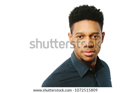 Portrait of a casual, happy young man isolated on white studio background	