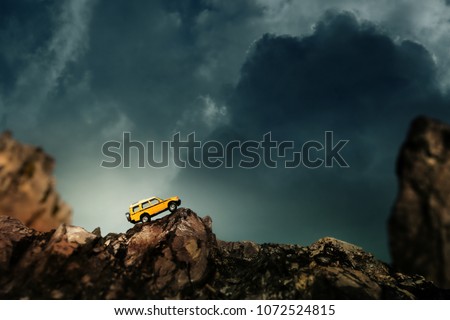 Four by four off road car crossing through the country road. Travel and racing concept for four wheel drive off road vehicle . Royalty-Free Stock Photo #1072524815
