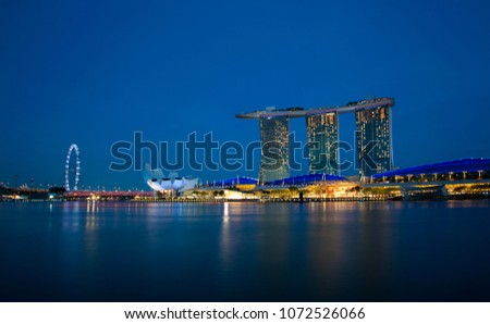Beautiful night light at the marina bay waterfront in Singapore. Travel Singapore. Travel Singapore 싱가포르 여행 前往新加坡 シンガポールへの旅行 Mus ncig teb chaws Singapore Viajar a Singapur Royalty-Free Stock Photo #1072526066