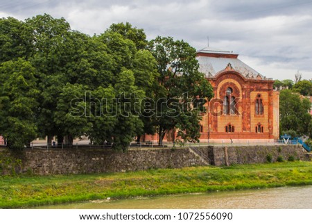 Ancient synagogue on the river bank in the city of Uzhhorod. Ukraine