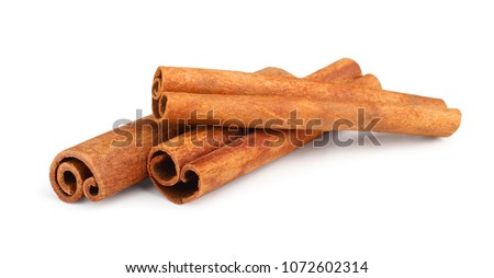 Cinnamon sticks isolated on white background Royalty-Free Stock Photo #1072602314