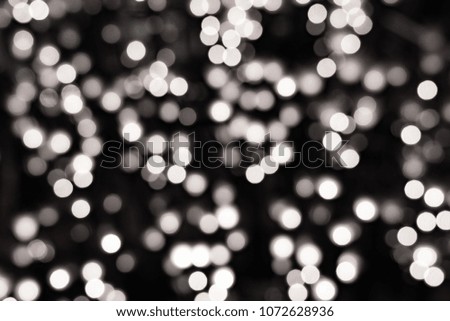 Bokeh monochromatic dot background small circles hint of color