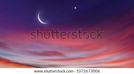 Crescent moon with beautiful sunset background . Generous Ramadan 