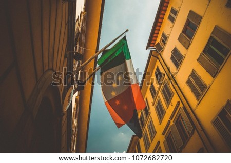Flag of Italy on street of Florence. HDR, horizontal