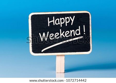 Little wooden tag with text - Happy Weekend. blue background