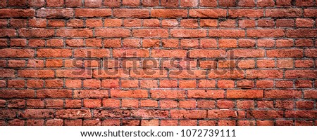 Old rustic brick wall panorama. Masonry background.