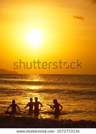 the sun creates a magical sunset in the Caribbean
