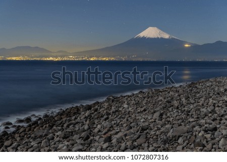 Mountain Fuji with starry night and suruga sea at Hida town , Shizuoka prefecture , Japan
