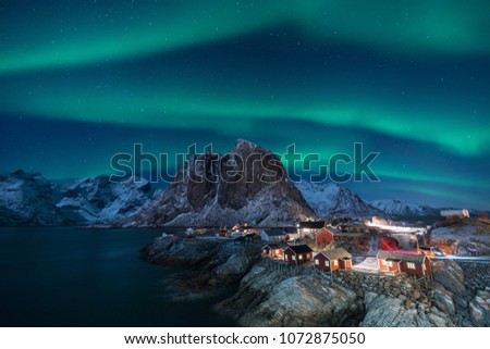 Fisherman village with Aurora in the background  travel concept world explore northern light