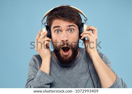 delight, man in headphones                              
